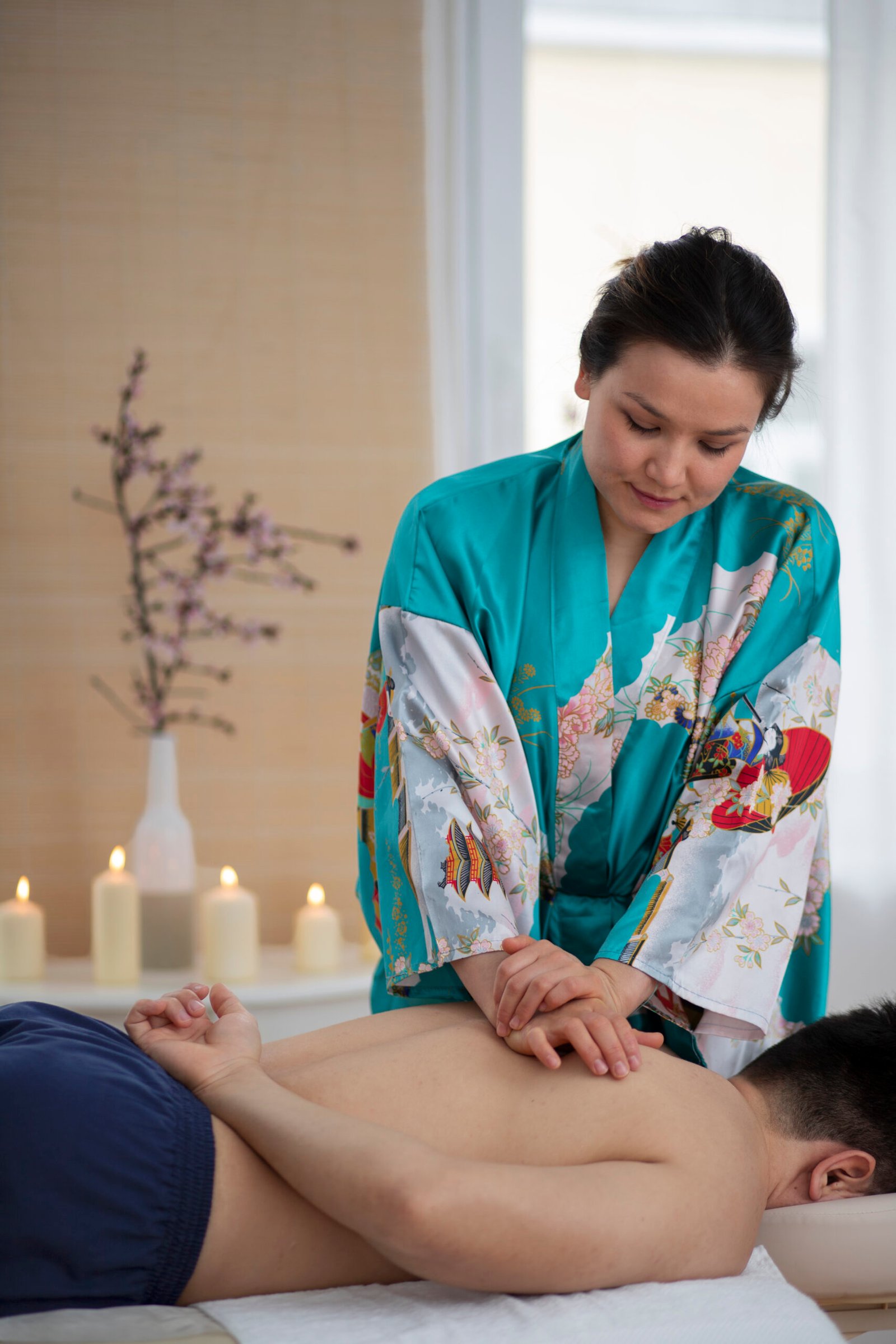 side view man getting back massage